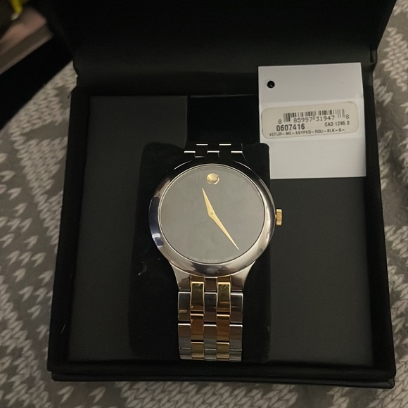Movado watch silver with black face worm a few times condition 7/10 - Picture 2 of 2